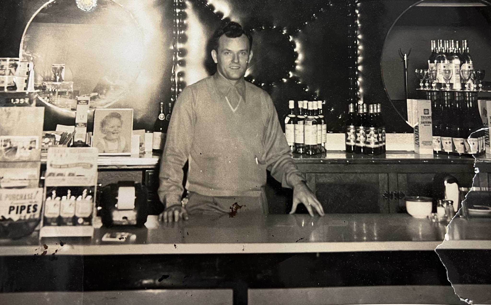 Ned Roberts behind the counter